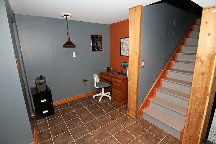 Finished basement with large bar