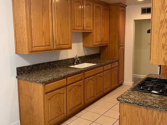 Large Kitchen with stove range, and built in oven. Tenant to bring their other appliances.