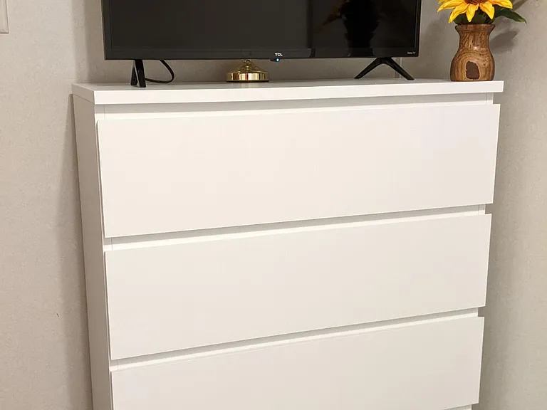 Smart tv in twin bed bedroom