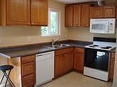 All new kitchen cabinets, porcelain flooring, & appliances.