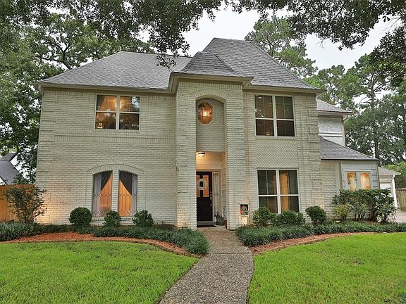 NICELY LANDSCAPED WITH GREENERY AND LIGHTING