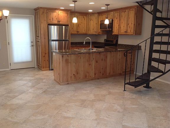 Updated Kitchen with granite countertops and stainless appliances.