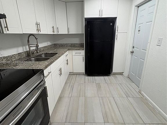 4th image of 447 NE 195th St APT 214