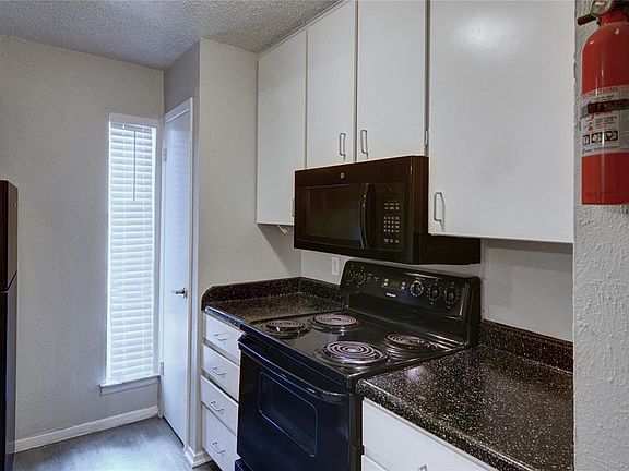 ANOTHER VIEW OF THE KITCHEN