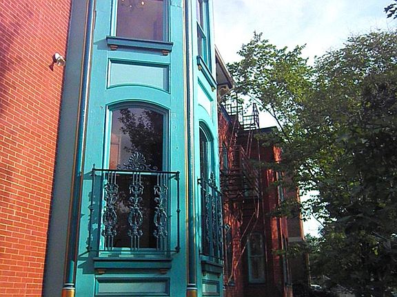 The Clara side of house bay window.jpg