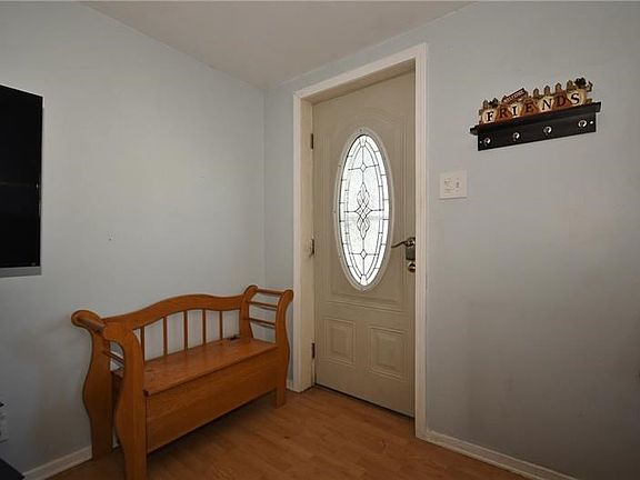 The front door features beautiful glass detail and a keyless entry option!