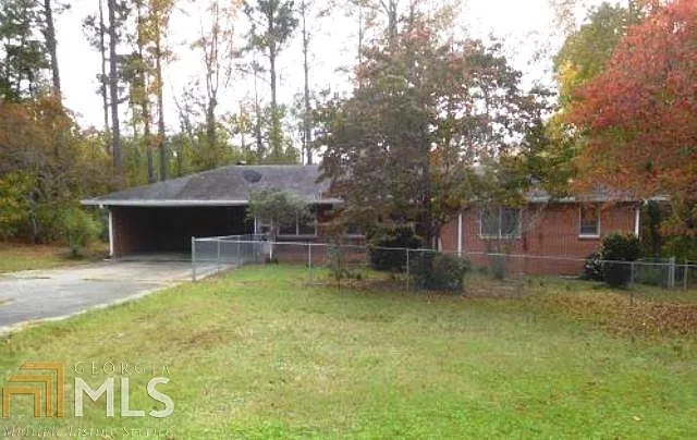 6121 Riggins Mill Rd photo 1