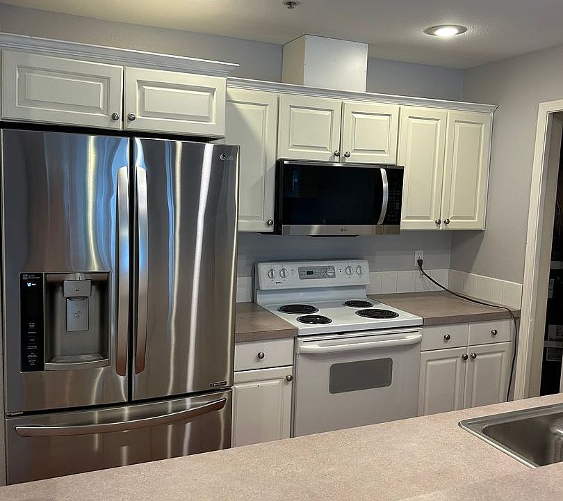 1st image of 12034 15th Ave NE Unit 310