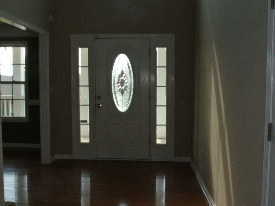 FOYER WITH HARDWOOD FLOORS