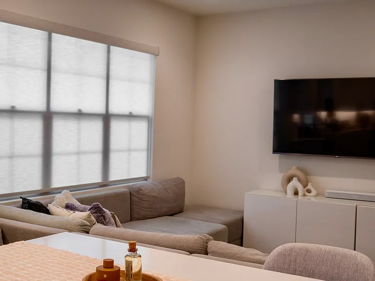 Bright Open Layout: Enjoy a direct view of the living and media center area right from your expansive kitchen island. The perfect setup for modern, connected daily living.