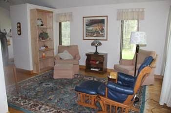 Large living room with ash floors.