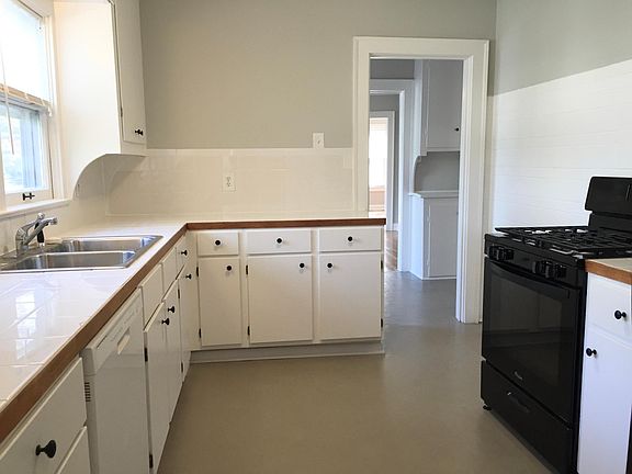 Lots of counter space with gas range, refrigerator and dishwasher.