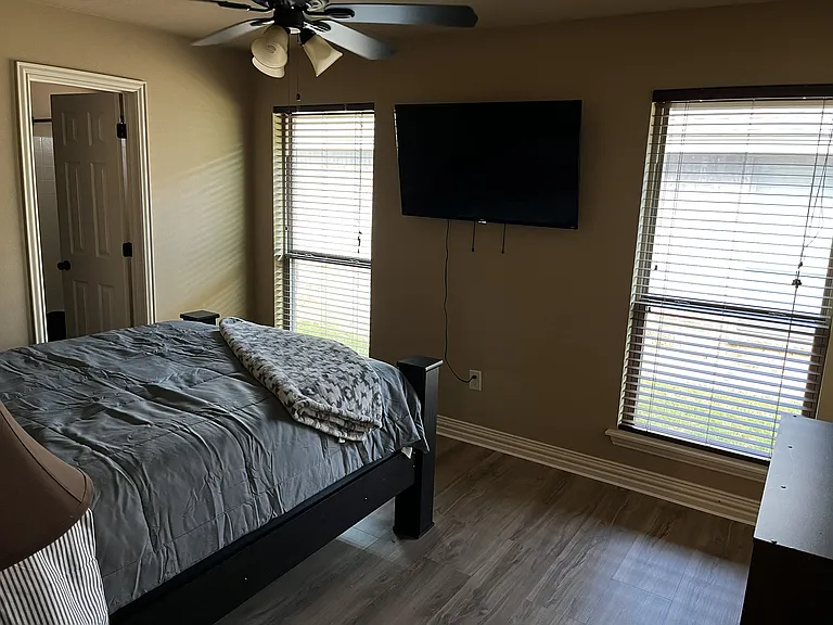 master bedroom with Roku TV
