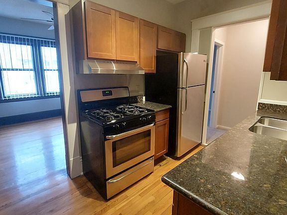 Most of this unit features stunning original hardwood flooring.