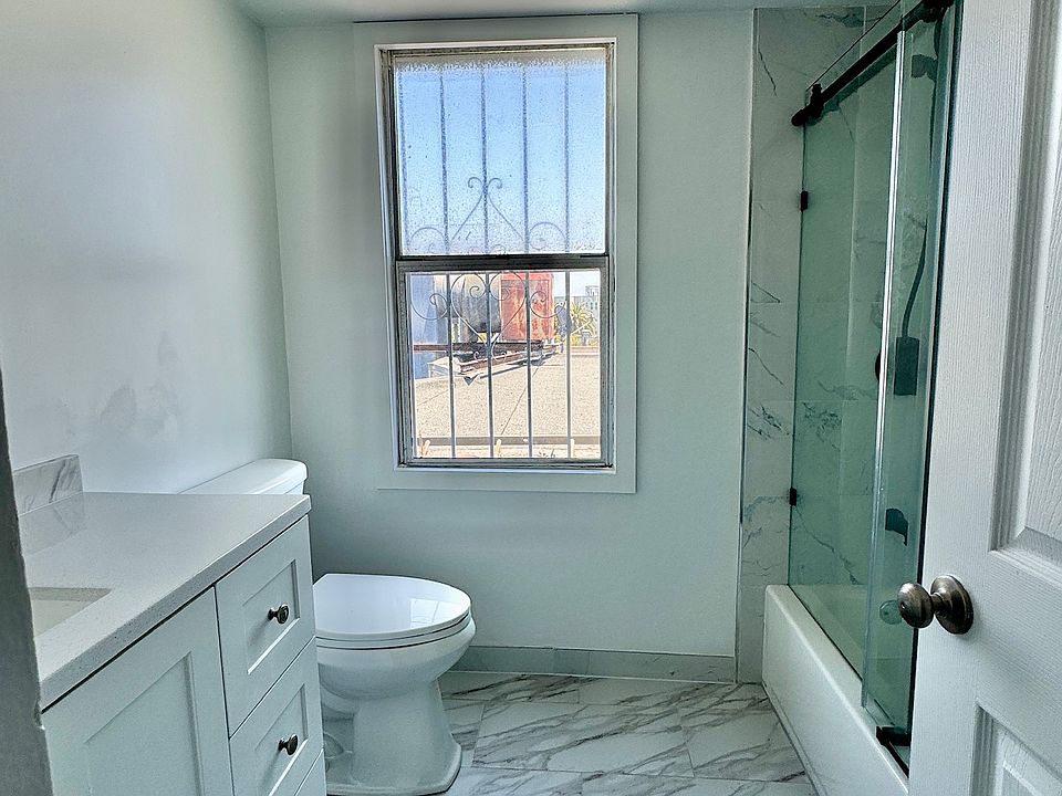 Brand new renovated bathroom with shower/tub combo and new fixtures