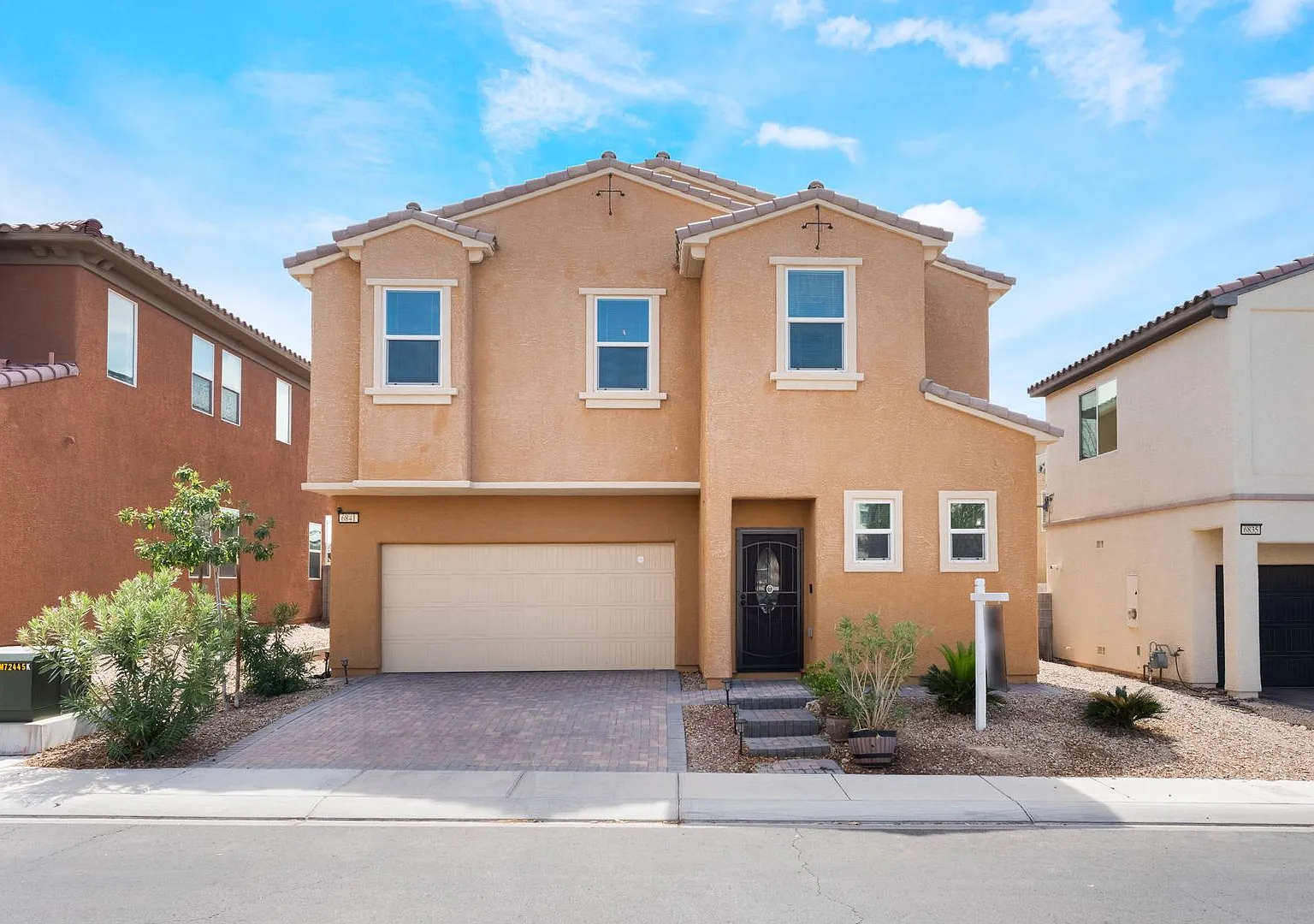 Welcome to this spacious 4-bedroom, 2.5-bathroom home at Sunrise Highlands Community! — Photo 1