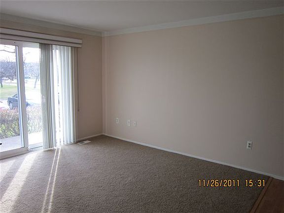 Living room, door wall to patio