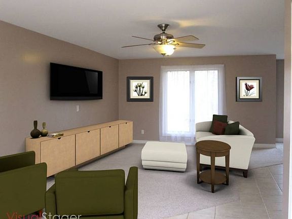 This virtually-staged photo shows one of the many possible furniture arrangements for the living roo