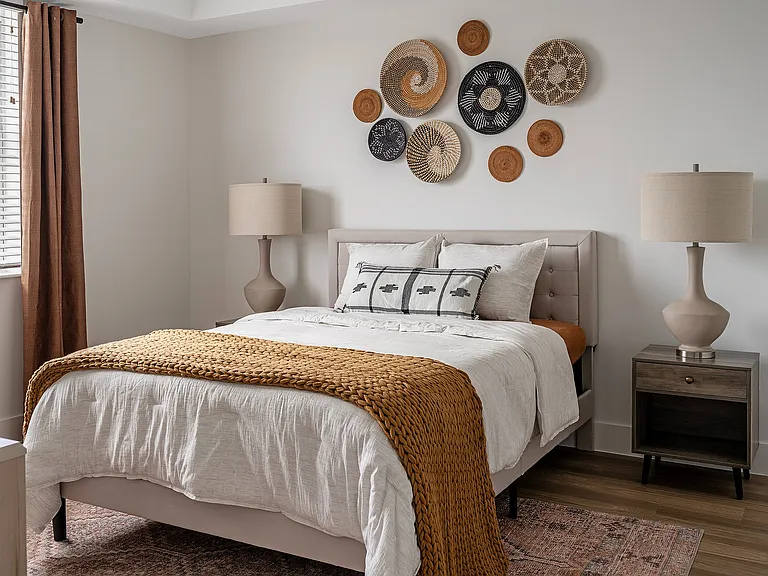 Experience relaxation in this elegantly designed bedroom, perfect for unwinding.