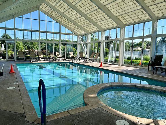 Indoor Pool Sunroom with Whirlpool and Wheelchair Lift