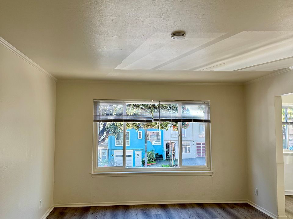 Living room view to Monterey Boulevard....Double pane windows so not much noise....