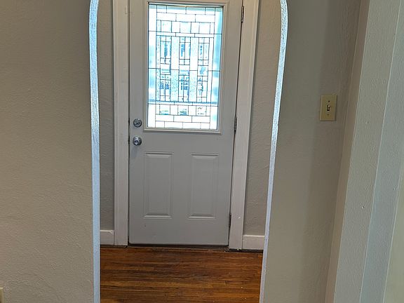 FRONT ENTRANCE - ARCHED DOOR WAY AND LEAD CRYSTAL TRIM
