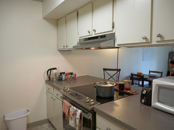 Kitchen with new slide in glass stop range - 201