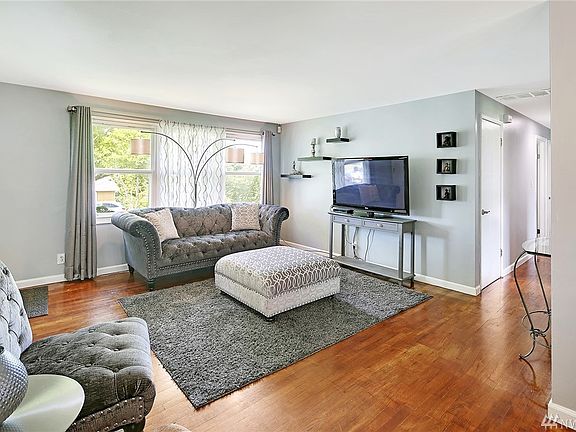 Large windows allow an abundance of natural light into this move-in condition home.