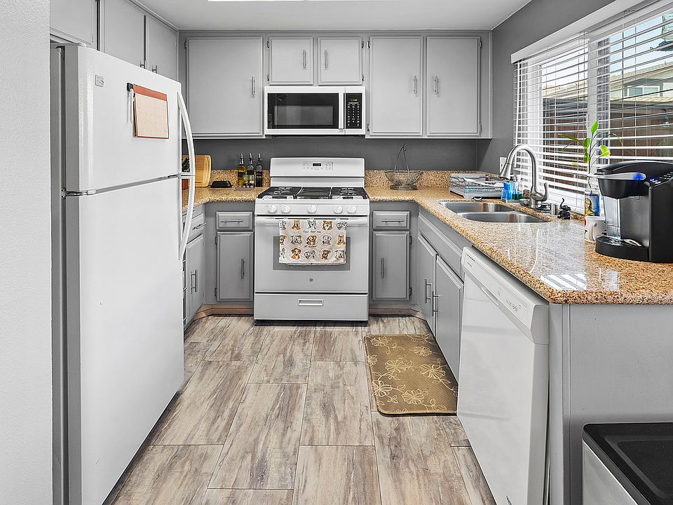 Fridge, stove, microwave, and dishwasher included