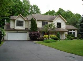 20 Winding Woods Way, Manalapan, NJ 07726