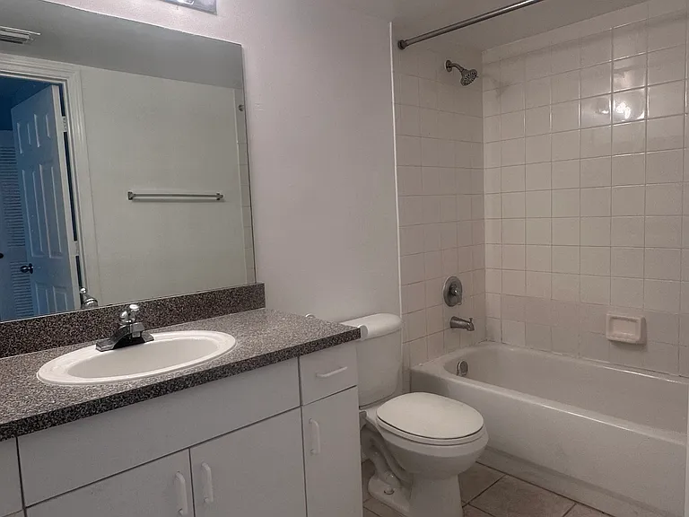 5011 Wiles Rd #207 — Photo 16