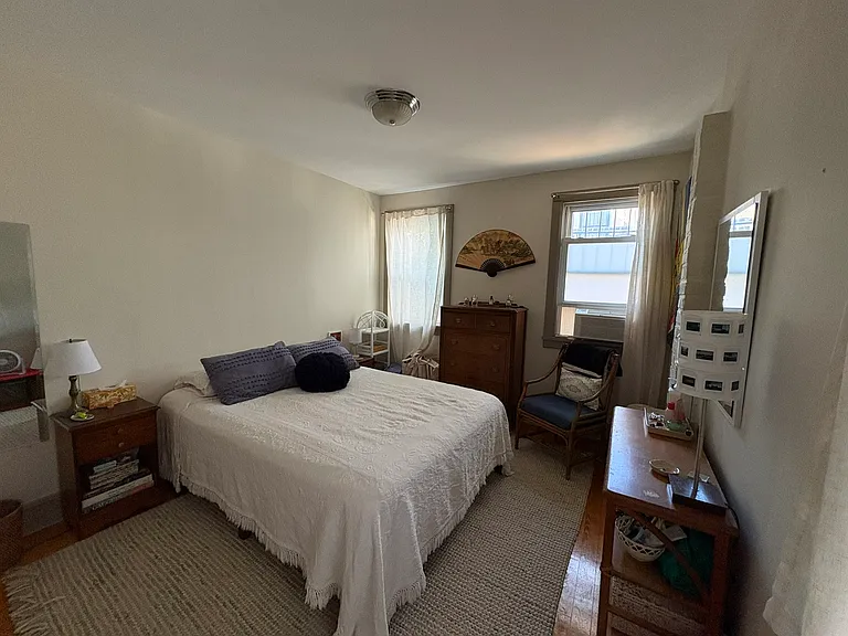 Bedroom with large closet to left of bed.