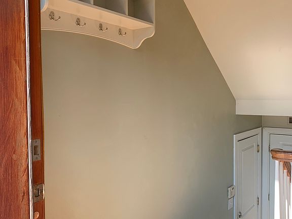 built in coat rack in foyer