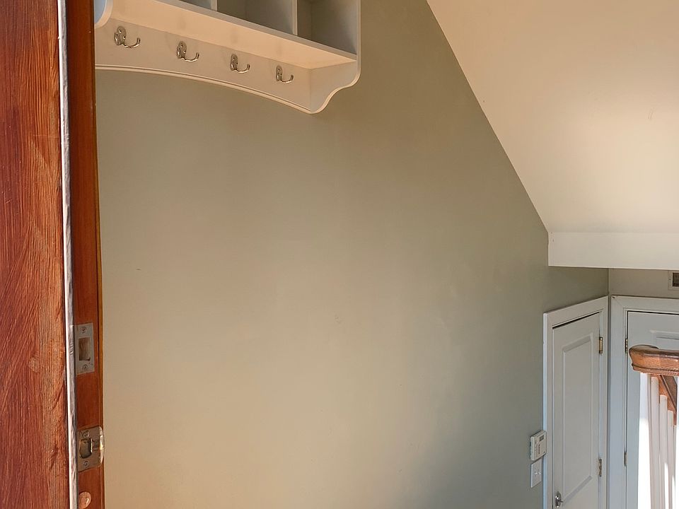 built in coat rack in foyer