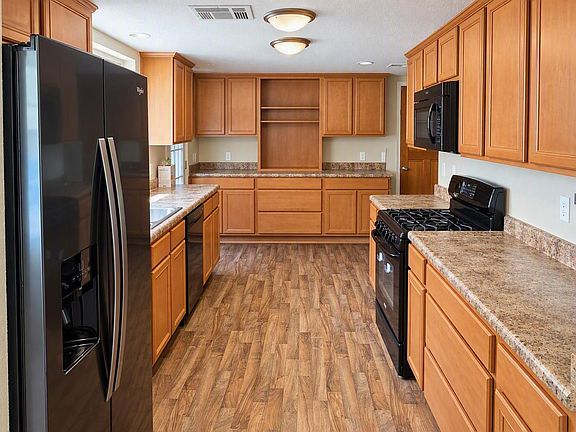Great kitchen, with lots of cabinets and counter space.