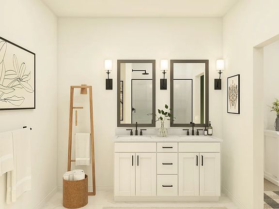 Primary bath features vanity with dual sinks