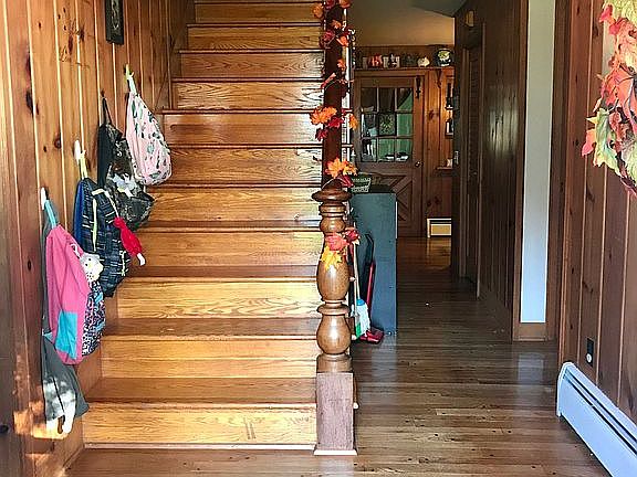Entryway, stairs up to attic