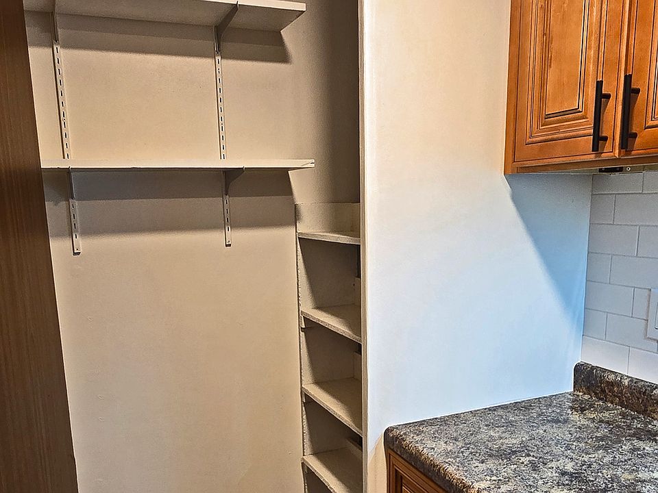 Kitchen with pantry 
Also has pull down stairs to attic for extra storage