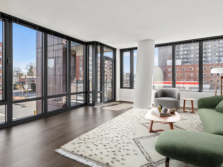 Enjoy floor to ceiling windows and a spacious living room with ample natural light