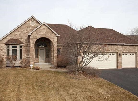 An impressive brick front adds to the curb appeal of this classy rambler.