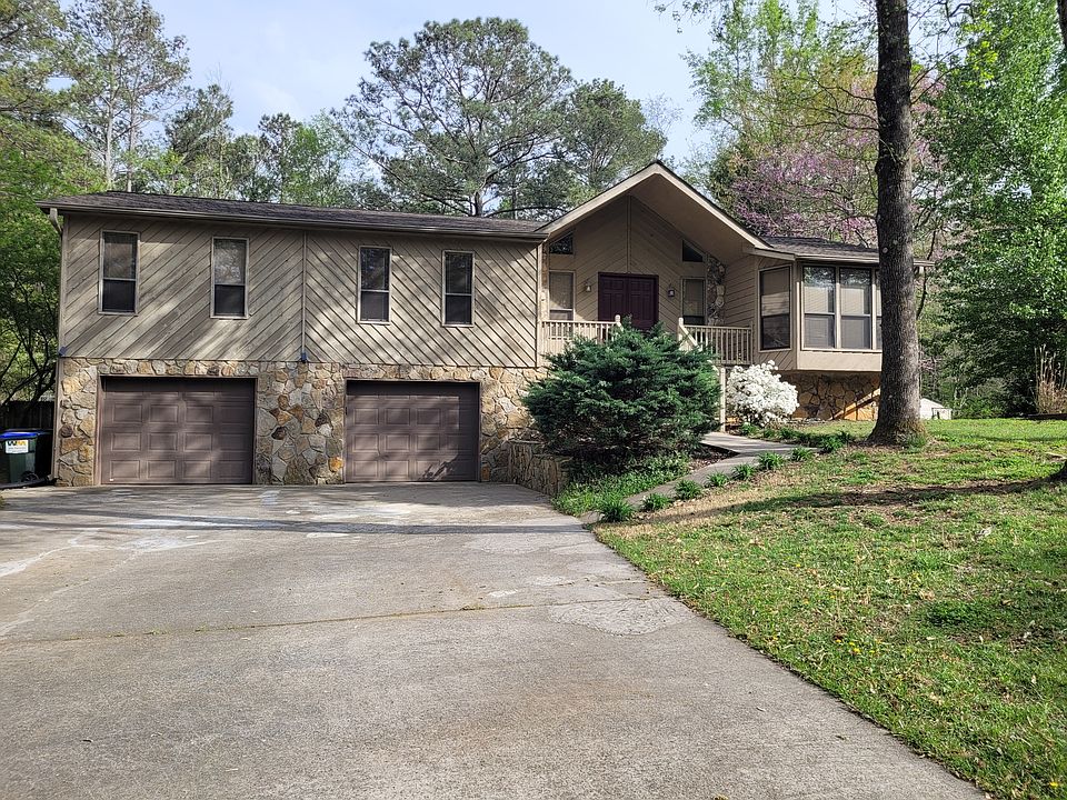 Very large level double driveway and front yard