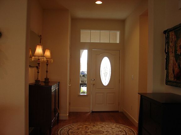 Beautiful entry with leaded glass window in door
