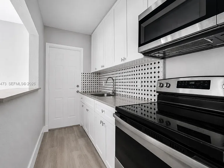 6647 SW 59th Pl #101 — Photo 9