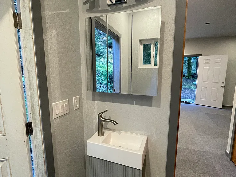 Bathroom vanity , looking out to kitchen