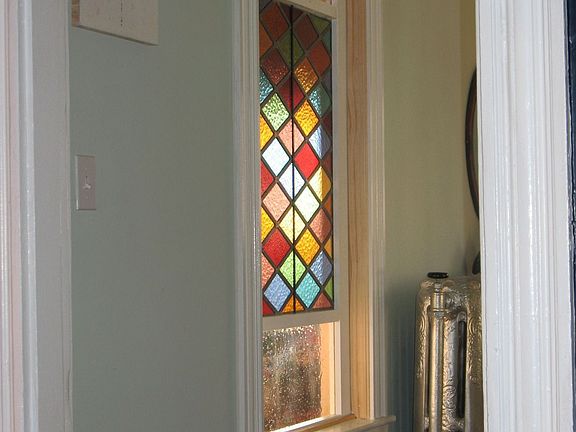 stain glass window in front hall
