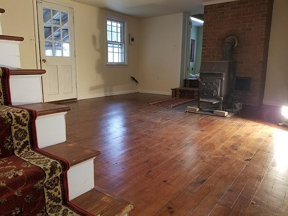 Living room downstairs with wood stove