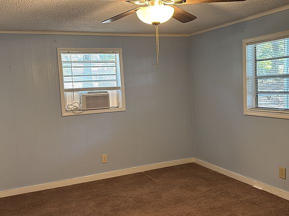one of two smaller bedrooms