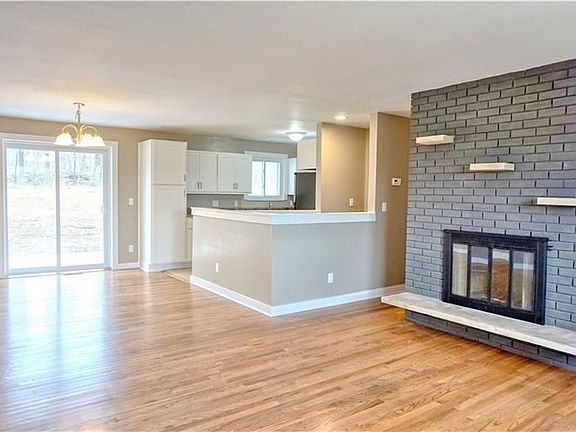 Featuring the desirable open floor plan and wood burning fireplace!