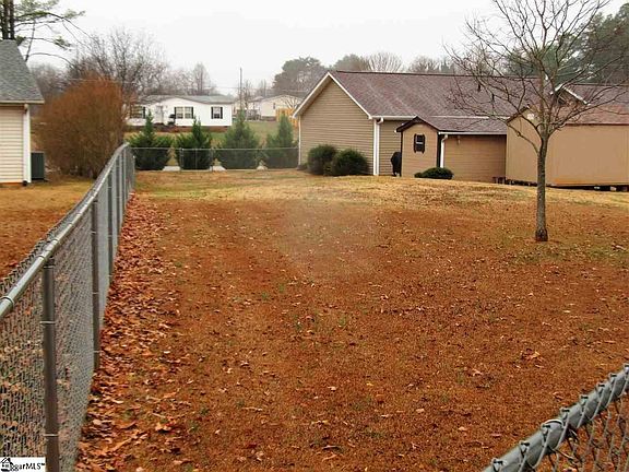 2 storage sheds and lots of room to run and play for pets and or children