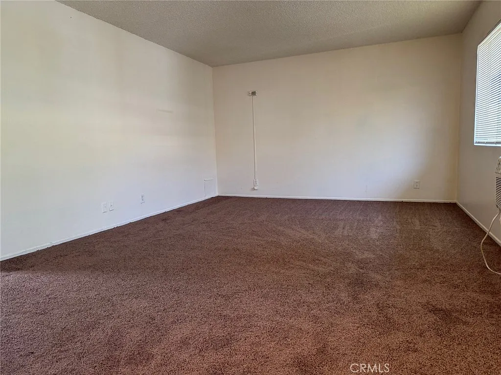 Building Photo - 13050 Dronfield Ave #24